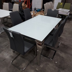 1 X LOUIS GLASS TOP DINING TABLE - IN WHITE (L 160 CM X W 90 CM X H 75 CM ) WITH 6 FAUX LEATHER CHAIRS ( PLEASE NOTE THIS IS CUSTOMER RETURNS )