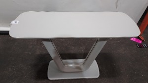 1 X LAZZARO LIGHT GREY GLASS TOP CONSOLE TABLE ( L 110 CM X W 40 CM X H 76 CM ) ( PLEASE NOTE THIS IS CUSTMER RETURN )