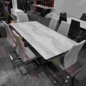 1 X GRANITE TOP TREMMEN DINING TABLE IN MILAN GREY ( L 200 CM X W 100 CM X H 77 CM ) WITH 6 FAUX LEATHER CREAM DINING CHAIRS ( PLEASE NOTE THIS IS CUSTOMER RETURN )