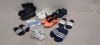 9 X PAIRS OF MIXED SHOES LOT CONTAINING PUMA AVANT FOOTBALL BOOTS IN FLUORESCENT ORANGE SIZE 9 , ROCKPORT TOTAL MOTION IN BLACK/BLUE SIZE 7, JACK & JONES IN WHITE , SIZE 8 , ADIDAS ADILETT SLIDERS IN WHITE/BLUE SIZE 6 (39), ETC ON A SHELVE