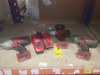 4 PIECE MILLWAKEE TOOL LOT CONTAINING 3 18V 1/2 HIGH TORQUE IMPACT WRENCH ONE CHARGING STATION.