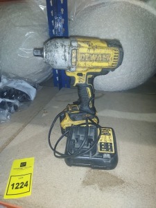 3 PIECE DEWALT LOT CONTAINING 1 IMPACT DRILLL , ONE BATTERY AND CHARGING STATION .