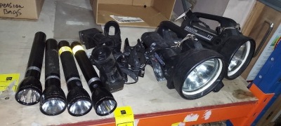 11 PIECE MIXED POLICE TORCHES THIS INCLUDES 4 MAG-LITE CHARGEABLE FLASHLIGHTS , 5 CHARGING PORTS , 2 LARGE SEARCH LIGHTS.