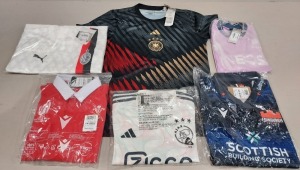 10 X BRAND NEW MIXED SPORTS CLOTHING LOT TO INCLUDE 1X AC MILAN PUMA FOOTBAL SHIRT SIZE M - 1X WALES RUGBY SHIRT SIZE M - 1X GERMANY ADIDAS FOOTBALL SHIRT SIZE M - 1X AJAX ADIDAS AWAY FOOTBALL SHIRT SIZE M ETC