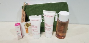 14 X BRAND NEW CLARINS GIFT BAGS CONTAINING BEAUTY BALM, HAND AND NAIL CREAM, CLEANSING MICELLAR AND LIP COMFORT OIL