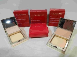 10 X BRAND NEW MIXED CLARINS PARIS MIXED FOUNDATION LOT TO INCLUDE 105 EVERLASTING COMPACT SP9 FOUNDATION 10G - 107 EVERLASTING CUSHION SPF50 FOUNDATION 13ML - 112 EVERLASTING SPF9 FOUNDATION 10G (MANUFACTURE DATE UNKNOWN)