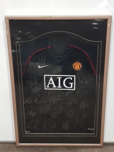 1 X MANCHESTER UNITED SQUAD SIGNED AWAY SHIRT. NO CERTIFICATE ( NOTE - GLASS INTACT - CELLOTAPE MARKS ON FRAME AND INSIDE GLASS )