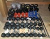 56 PIECE MIXED GYM LOT CONTAINING EVERLAST RUBBER HEX SETS OF 2 DUMBELLS - 3 KG / 4 KG / 5 KG / 7 KG / 10 KG EVERLAST PLASTIC SET OF 2 DUMBELLS - 1 KG / 2 KG EVERLAST METAL WEIGHT PLATES SET OF 2 - 2.5 KG / 5 KG / 10 KG KETTLE BELLS -15 LBS / 10 LB