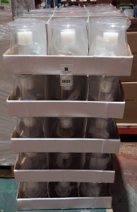 60 X BRAND NEW CLEAR CANDLE VASES / HOLDERS WITH DECORATIVE STONES AND 1 SMALL PILLAR CANDLE SILVER / GOLD AND WHITE STONES - IN 5 TRAYS OF 12