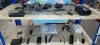 ASSORTMENT OF 16 SMALL ETHERNET SWTICHES & POWER BANKS - ABKER, RING, ANTON PLUS 3 X LOGIC USB CAMERAS ON 2 SHELVES