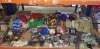 1000 + MIXED AFRICAN LOT CONTAINING GHANIAN FLAGS - WOODEN TRIBAL ORNAMENT WITH BEADS - TRENDY WORLD KING OF KINGS RASTAFRI JACKET IN BEIGE - BOB MARLEY THEMED DECORATIVE CLOTH - LARGE QUANTITY OF VARIOUS NECKLACES AND WRISTBANDS IN MULTIPLE STYLES AND S