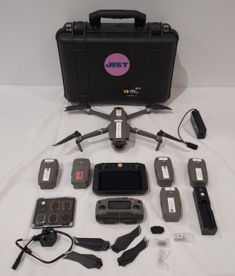 DJI MAVIC 2 PRO DRONE WITH A DJI SMART CONTROLLER AND A DJI RC1B CONTROLLER IN A CARRY BOX