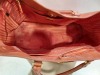 1 X ORANGE COLOURED LEATHER LIKE HAND BAG ( PRADA BRANDED - NO SERIAL NUMBER FOUND ) - 2