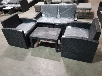 1 X STUDIO ALLIBERT 4 PIECE GARDEN RATTAN SET TO INCLUDE 1 TWO SEATER SOFA / 2 SINGLE SEAT CHAIRS AND 1 TABLE - ALL IN BLACK WITH GREY CUSHIONS - OUT OF BOX - ( PRE - BUILT) PLEASE NOTE CHAIR BACK REST CUSHIONS MISSING