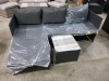 1 X STUDIO BALI RATTAN CORNER SOFA SET - IN BLACK COLOUR WITH GREY COLOURED CUSHIONS ( SOME HAVE WATER DAMAGE) (PRE - BUILT) - NO TABLE