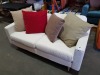 1 X 2 SEATER WHITE FABRIC SOFA - LENGTH 172CM - WIDTH 90CM - HEIGHT 87CM WITH 4 VARIOUS CUSHIONS