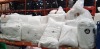 30 + BRAND NEW MIXED BEDDING LOT CONTAINING GOOSE FEATHER & DOWN PILLOWS SIZE 20 X 36 - MUSBURY PEACHSKIN DUVET IN KING SIZE 225 X 220CM 13.5 TOG - ISLAND DUVET 4.5 TOG - TWIN DUVET 4.5 TOG - VARIOUS CUSHIONS ETC ON A FULL BAY