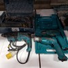 4 PIECE TOOL LOT CONTAINING 1 X MAKITA ( HR2630 ) HAMMER DRILL 110 V - WITH CARRY CASE 1 X BOSCH ( GBH 2-28 DFV ) HAMMERDRIL 110 V - WITH CARRY CASE 2 X MAKITA CORDLESS DRIVER DRILLS - WITH BATTERYS - NO CHARGERS - 1 CARRY CASE