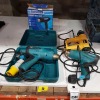 4 PIECE TOOL LOT CONTAINING 1 X BRAND NEW ENERGER 2000W HEAT GUN 1 X DEWALT (D26414-LX) HEAT GUN - 110V 2 X MAKITA ( HG5012) HEAT GUN - 110 V - 1 CARRY CASE