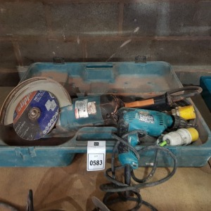 2 PIECE TOOL LOT CONTAINING 1 X MAKITA ANGLE GRINDER (9069)- WITH CARRY CASE AND SPARE BLADE 1 X MAKITA DRILL - 110 V ( 6413) - NO CARRY CASE