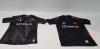 23 X BRAND NEW MIXED CLOTHING LOT CONTAINING 17 X ASTRALIS 20/21 GAME JERSEY IN BLACK WITH MIXED SPONSORS ALL IN SIZE SMALL - 6 X FNATIC PRO JERSEY 2021 IN BLACK WITH MIXED SPONSOR DESIGNS ALL IN SIZE MEDIUM - IN ONE TRAY - TRAY NOT INCLUDED