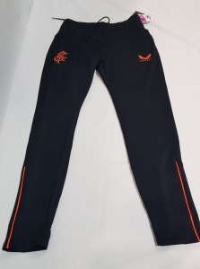 20 X BRAND NEW CASTORE RANGERS TRACKSUIT PANTS IN SIZE 14 LARGE IN BLACK/ORANGE - IN ONE TRAY - TRAY NOT INCLUDED