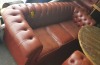 3 SEATER TAN COLOURED BUTTON BACKED LEATHER LOOK SOFA