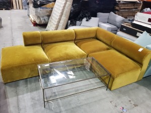 1 X 4 SEATER L SHAPE VELVET SOFA IN MUSTARD - AND 1 X GLASS TOP WITH BRASS COLOURED FRAME COFFEE TABLE SLIGHT SCUFF MARKS (SOFA.COM RETURNS)