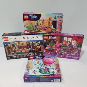 4 PIECE BRAND NEW BOXED MIXED LEGO LOT CONTAINING 1 X LEGO FRIENDS - THE TELEVISION SERIES ( ITEM # 21319) 1 X LEGO FRIENDS - ADVENT CALENDAR ( ITEM # 41420 ) 1 X LEGO DREAMWORKS TROLLS WORLD TOUR - LONESOME FLATS RAFT ADVENTURE ( ITEM # 41253 ) 1 X LEG