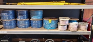 12 PIECE MIXED ROPE LOT CONTRAINING 6 X BRAND NEW 6MM X 500 METER BLUE POLYPROPYLENE ROPE ON DRUMS / 1 X BRAND NEW 10 MM X 500- METER ROPE ON DRUM / 4 X BRAND NEW HIGH TENSILE ROPE ON DRUMS ( UNKNOWN LENGTH ) ETC - ON 1 FULL SHELF