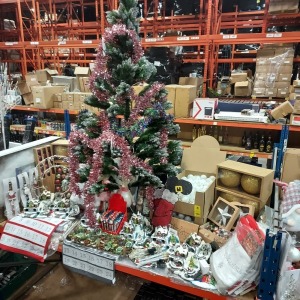 FULL BAY OF MIXED PREMIER CHRISTMAS LOT CONTAINING 6FT PRE- DECORATED CHRISTMAS TREE , ANIMATED CHRISTMAS VILAGE SCENE'S , LARGE CHRISTMAS BAUBLES , DECORATIVE TREE SKIRT'S , SNOWFLAKE AND BERRY TEA LIGHT HOLDER , SANTA BOOT PATH FINDER LIGHTS , ETC ON A 