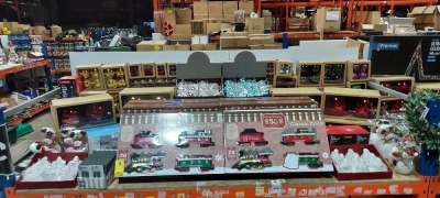 FULL BAY OF MIXED PREMIER CHRISTMAS LOT CONTAINING PLATFORM 53 CLASSIC TRAIN SETS , 10 BULB FESTOON LIGHTS SIZE 4.5M LIT LENGTH , 4 PIECE SILVER TREE LIGHTS 200 LED'S , LIT SNOWMAN WITH SNOWBALL CHARACTER , VARIOUS CHRISTMAS BAUBLES IN VARIOUS SIZES IN GR