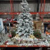 FULL BAY OF MIXED PREMIER CHRISTMAS LOT CONTAINING 6 FOOT SNOW EFFECT CHRISTMAS TREE , LED TREE'S , ACRYLIC 3 PIECE SET OF CROWN'S , SNOW EFFECT GARLAND , CHRISTMAS WREATHS IN RED AND GREEN , FLASHING LED TEA LIGHT'S ETC ON A FULL BAY