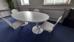 1 X WHITE OVAL SHAPED TABLE WITH 4X WHITE CHAIRS *** NOTE: ASSETS LOCATED IN BLACKBURN - COLLECT IN PERSON ONLY - BOOK SEPARATE COLLECTION TIME ***