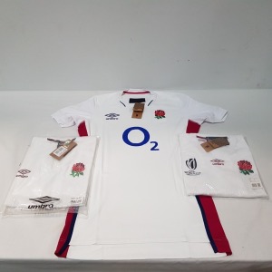 20 X BRAND NEW UMBRO RUGBY TOPS IN WHITE IN MIXED SIZES M , XXL , L AND S , IN ONE TRAY (TRAY NOT INCLUDED)