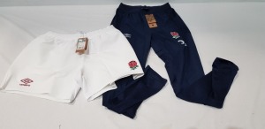 20 X BRAND NEW MIXED UMBRO RUGBY CLOTHING LOT CONTAINING ENGLAND, ENGLAND HOME PRO SHORTS IN WHITE SIZE 4XL , ENGLAND PRESENTA PANTS IN NAVY BLUE SIZE M , ENGLAND CONTACT TRAINING SHORTS IN NAVY BLUE SIZE XXL ETC IN ONE TRAY (TRAY NOT INCLUDED )