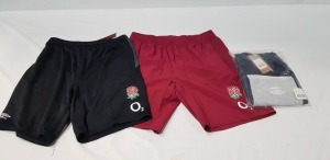 17 X BRAND NEW MIXED UMBRO RUGBY CLOTHING LOT CONTAINING ENGLAND ALTERNATE PRO SHORTS IN BLACK , NAVY BLUE AND RED IN MIXED SIZES ETC IN ONE TRAY (TRAY NOT INCLUDED )