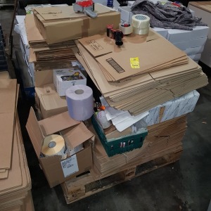 1 PLT OF MIXED PACKAGING ITEMS TO INCLUDE CLEAR TAPE / WHITE STICKY LABELS / VARIOUS SIZES CARDBOARD BOXES / PAPER BAGS / CAUTION TAPE / LIQUID INSIDE TAPE / MEASURING TAPE / LASER LITE EARPLUGS / FRAGILE TAPE