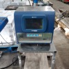 1 X DOMINO AX 150 I INKJET PRINTER STAND ASSEMBLY - INCLUDES CONVEYOR BELT (S/N 1146817 . 1245 ) AND 1 BOX OF VARIOUS BRAND NEW SPARE PARTS - 3