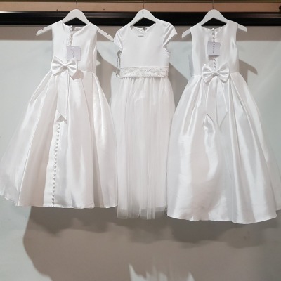 10 X BRAND NEW LINZI JAY KIDS WHITE DRESSES WITH BOW DESIGN AND ONE WITH OUT IN MIXED SIZES 8/9/7/6