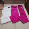 10 X PIECE BRAND NEW MIXED JUICY COUTURE CHILDREN'S CLOTHING LOT TO INCLUDE 7 X HEARTBREAKER SUPERSOFT SKINNY JEANS IN PINK SIZE 14 YEARS - 2 X HEARTBREAKER FUSCHIA SLIM PANTS IN SIZE UK8 TO 10 - 1X ANGEL MODERN TRACK SLIM PANTS IN CREAM SIZE UK 12 TO 14