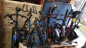 6 PIECE MIXED EXERCISE BIKES LOT TO INCLUDE 3 X REEBOK GSB EXERCISE BIKES IN BLACK AND BLUE AND 3 X REEBOK IONE GB 50 EXERCISE BIKES IN BLACK AND RED (PLEASE NOTE ALL FOR SPARE AND REPAIR ONLY ) - ON 2 PLTS