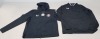 13 X PIECE BRAND NEW MIXED CLOTHING LOT TO INCLUDE - 7 X CASTORE CHARLTON RAIN JACKETS SIZE 11-12 YEARS - 1X CASTORE BLACK TRACK JACKET SIZE XS - 3 X CASTORE TRAINING T-SHIRTS IN BLACK SIZE JL - 2X AMC LONGSLEEVE POLO