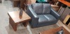 3 X PIECE MIXED FURNITURE LOT TO INCLUDE 1X 2 SEATER SOFA IN BLACK LEATHER STYLE - 1X BROWN WALNUT COFFEE TABLE - 1X BROWN TABLE ORNAMNET