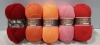 112 X BRAND NEW STYLE CRAFT KNITTING YARNS IN VARIOUS COLOURS TO INCLUDE BLUSH - TOMATO - ORANGE - PINK - GREEN - PURPLE ETC IN SIZE 295M