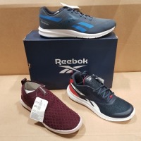 15 X BRAND NEW MIXED REEBOK WOMENS TRAINERS CONTAINING 4 X EVEROAD DMX SLIP TRAINERS IN MAROON/WHITE IN SIZE USA 10 , 3 X RUSH RUNNER 3 TRAINERS IN NAVY/WHITE AND RED IN SIZE USA 6.5 , 2 X QUICK MOTION 2.0 TRAINERS IN INSTINCT RED IN SIZE USA 9 , 2 X RU