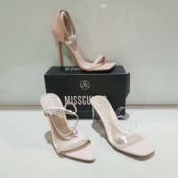15 X MIXED MISSGUIDED WOMENS SHOES CONTAINING MID ILLUSION HEEL CLEAR SANDALS IN CLEAR, POINTED TOE PATENT BARELY THERE IN NUDE , PERSPEX SQUARE TOE WEDGE HEEL IN NUDE , SQUARE TOE PATENT HEELED SANDAL IN SAND ETC ALL IN SIZE 5 (NOTE - SOME HAVE SECURITY