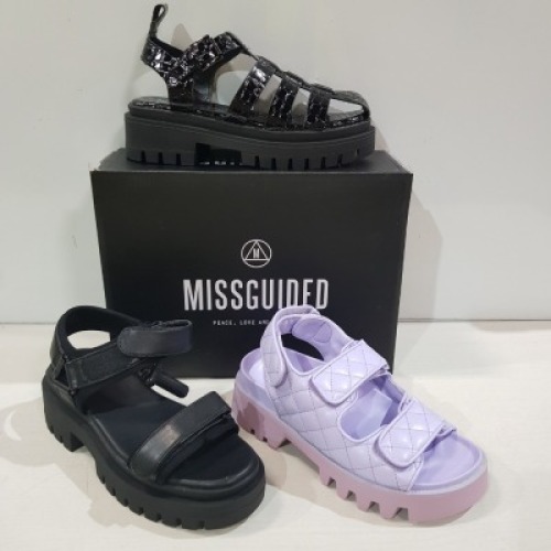 12 X MIXED MISSGUIDED WOMENS SANDALS CONTAINING QUILTED SANDAL IN LILAC , CHUNKY CROC FLAT SHOES IN BLACK , VELCRO STRAP SANDAL IN BLACK IN MIXED SIZES IE 3,4 AND 5 (NOTE - SOME HAVE SECURITY TAGS)