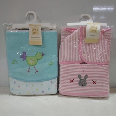 20 X BRAND NEW MIXED LOT CONTAINING 11 LOLLIPOP LANE BABY NEST - BABY BLANKET/NAPPY CHANGE QUILT IN PINK/WHITE , 9 LOLLIPOP LANE MOSES BASKET BEDDING SET TO INCLUDE REVERSIBLE BLANKET , CRIB FITTED SHEET , SOFT JERSEY BAG IN MULTI COLOUR IN ONE TRAY ( TRA