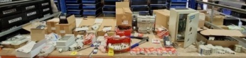 FULL BAY OF MIXED ELECTRICAL INDUSTRIAL LOT PARTS INCLUDING T.I.M. 2D 2 DOOR INTERLOCK MODULLE , BIL SL3 STREELIGHTING 5W SINGLE POLE FULE BOXES , SIEMENS ISOLATOR SWITCH BOX , SWITCH BOARD , AMP PLUG , AND FUSE PLUGS ETC ON A FULL BAY